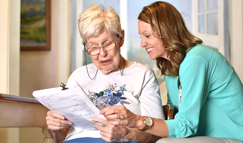 RN Kathleen Lewis with Patient