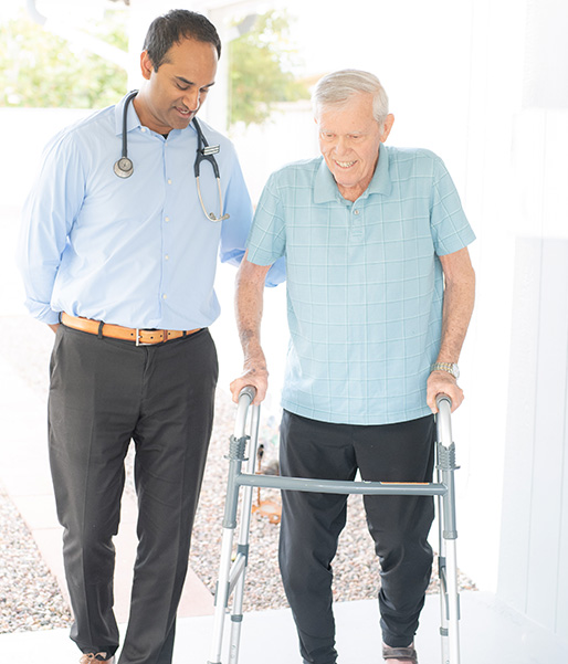 Nurse helping elderly woman